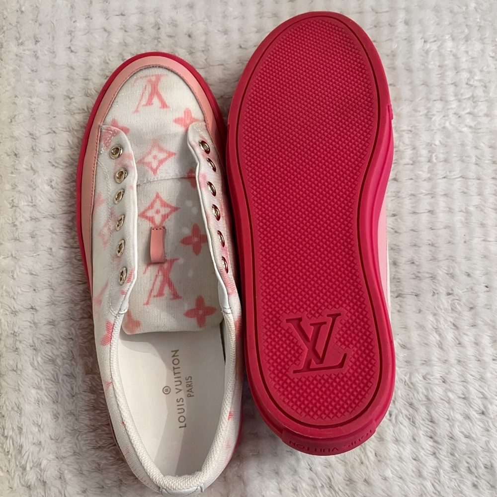 Pink LV stellar trainers.